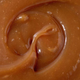 Thick, rich, golden brown caramel sauce